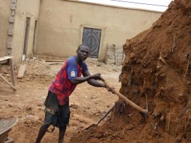 Digging heaps of sand